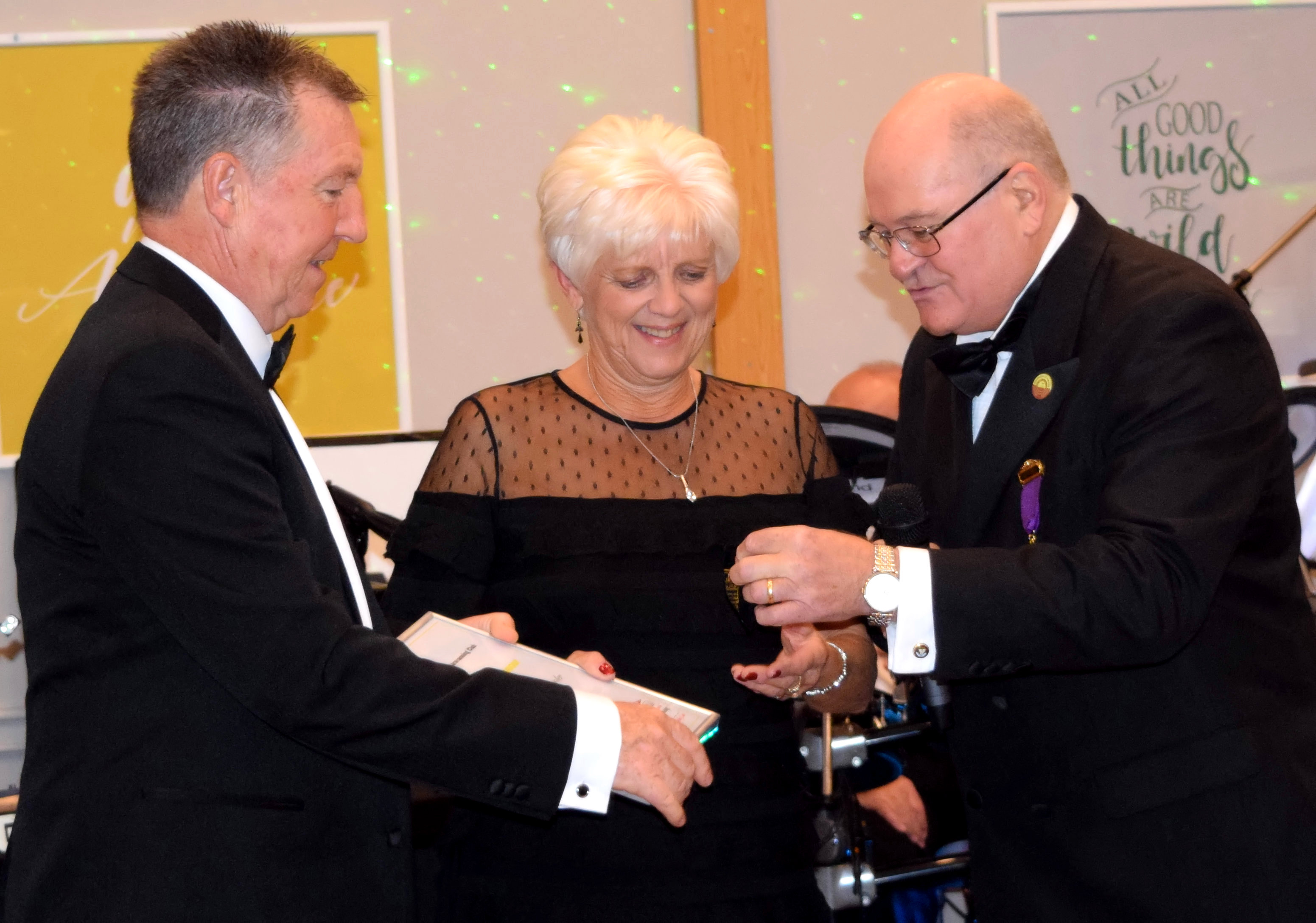 Club Vice-Chairman Mr Phil Henson presents the Certificate of Honour to Pat and Christine Carpenter at the Southern Region Dinner Dance 2018